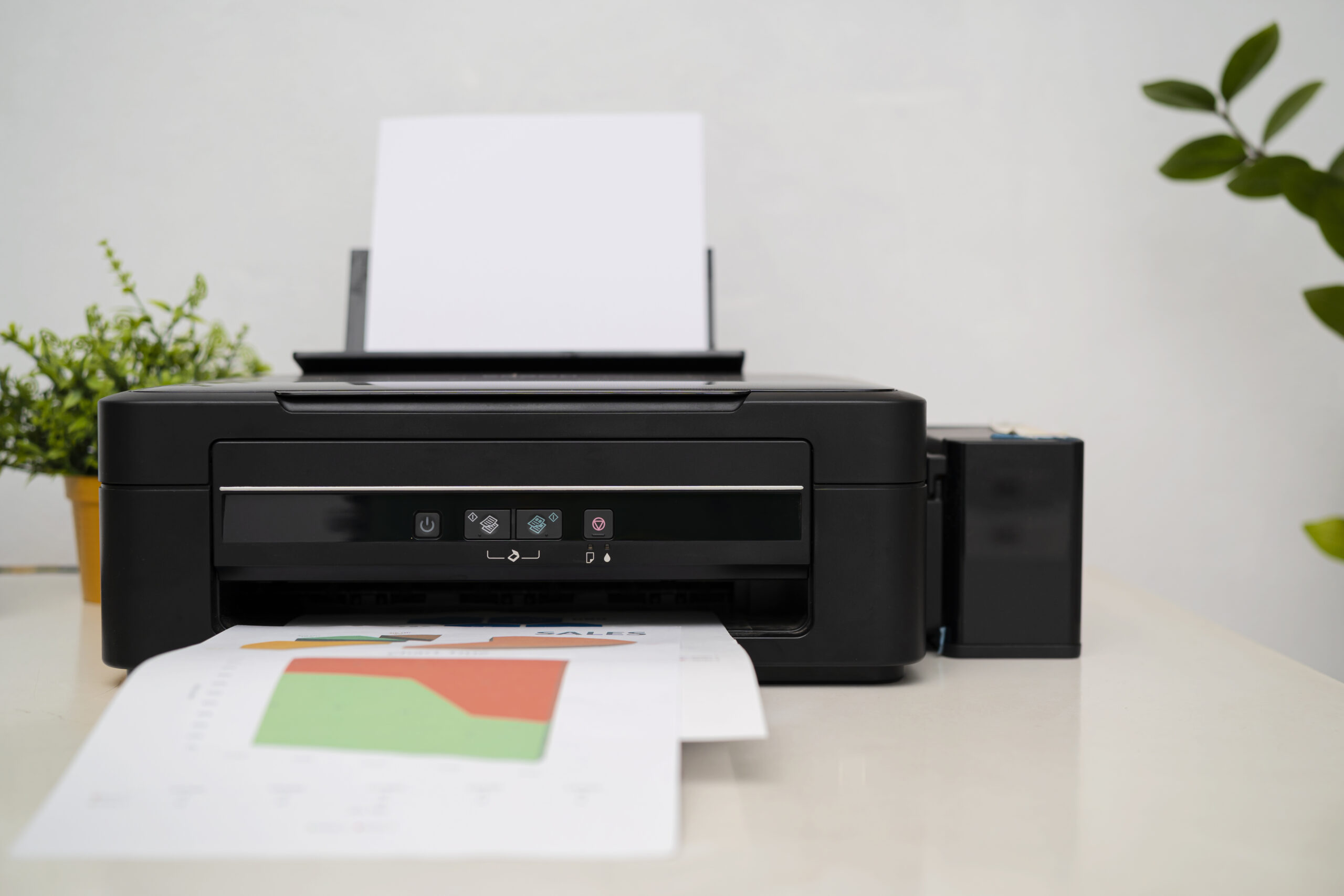 Close view of a laser printer on a desk